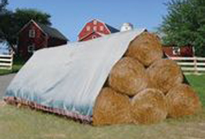 Sunshield tarp covering hay